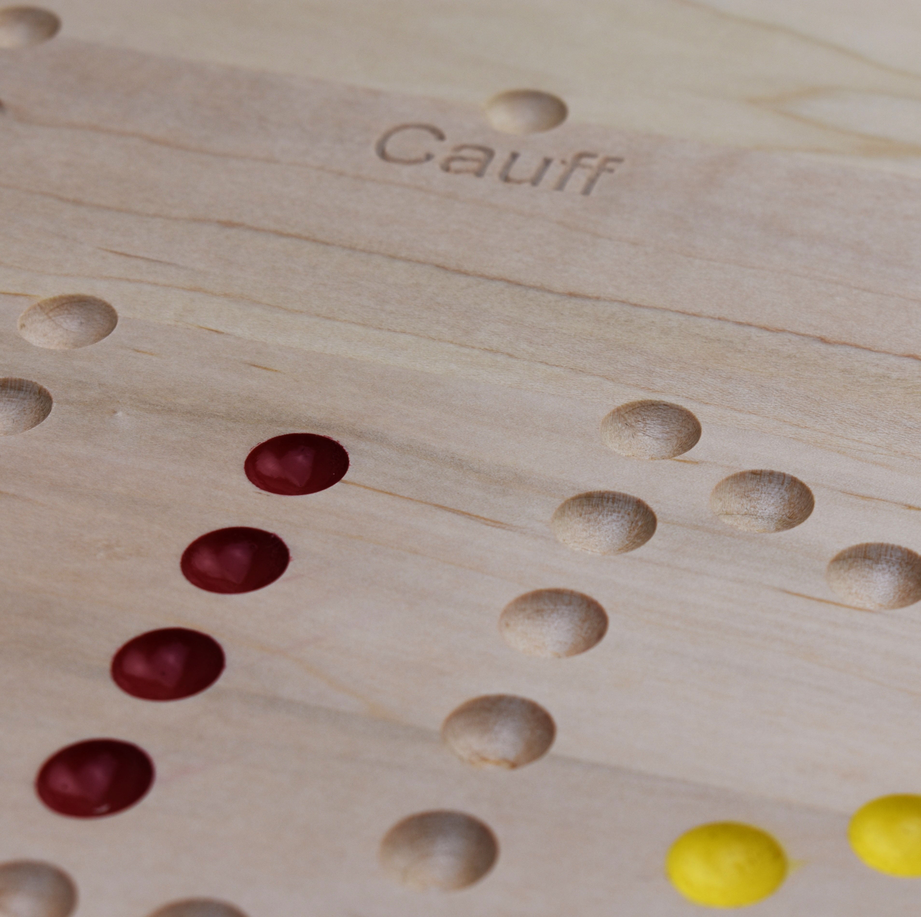 Cauff logo engraved on maple wooden marble board game