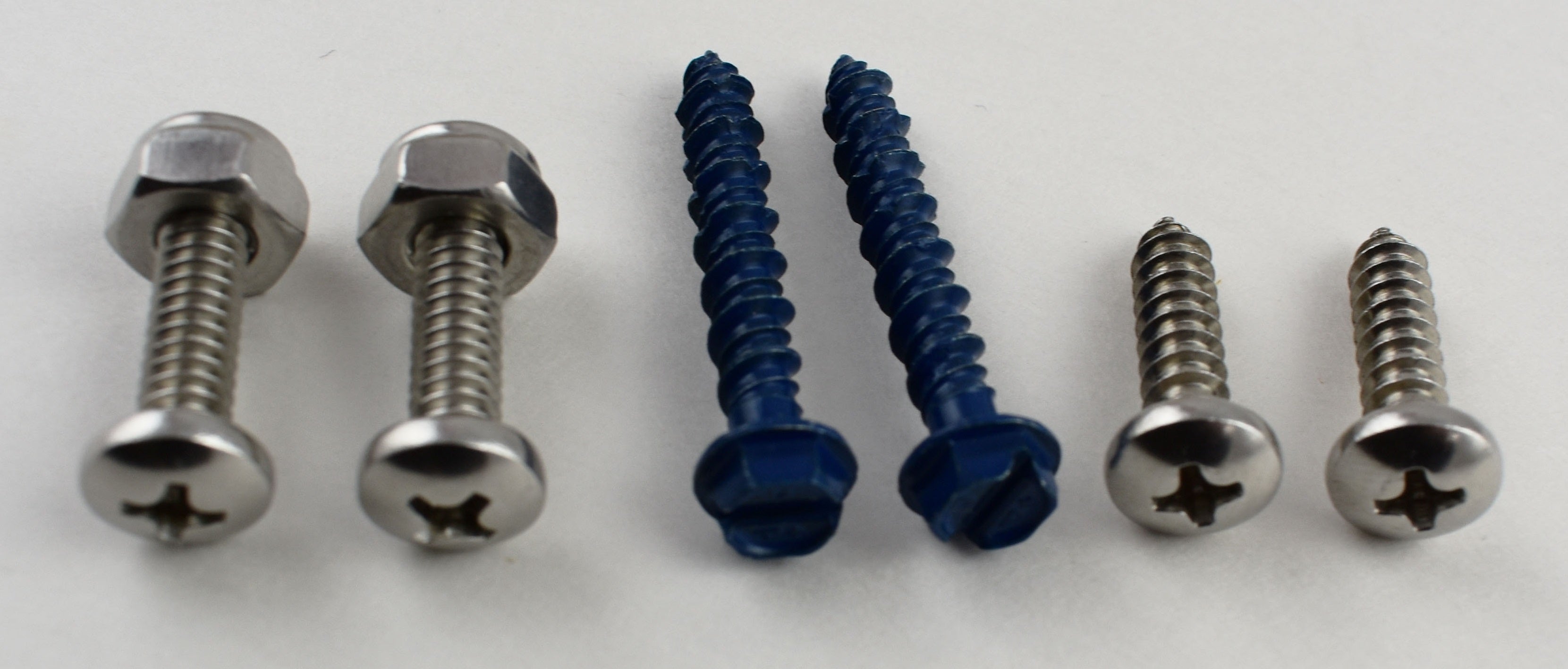 Close-up view of poly mailbox flag and stainless bolts for replacement kit